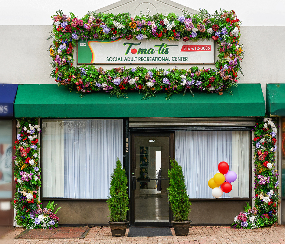 Store Front of Tomatis Social in Elmont NY